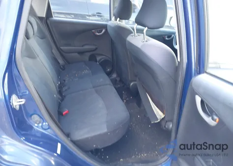 2009 Honda Fit Sport from USA, damaged, VIN JHMGE88469S014653